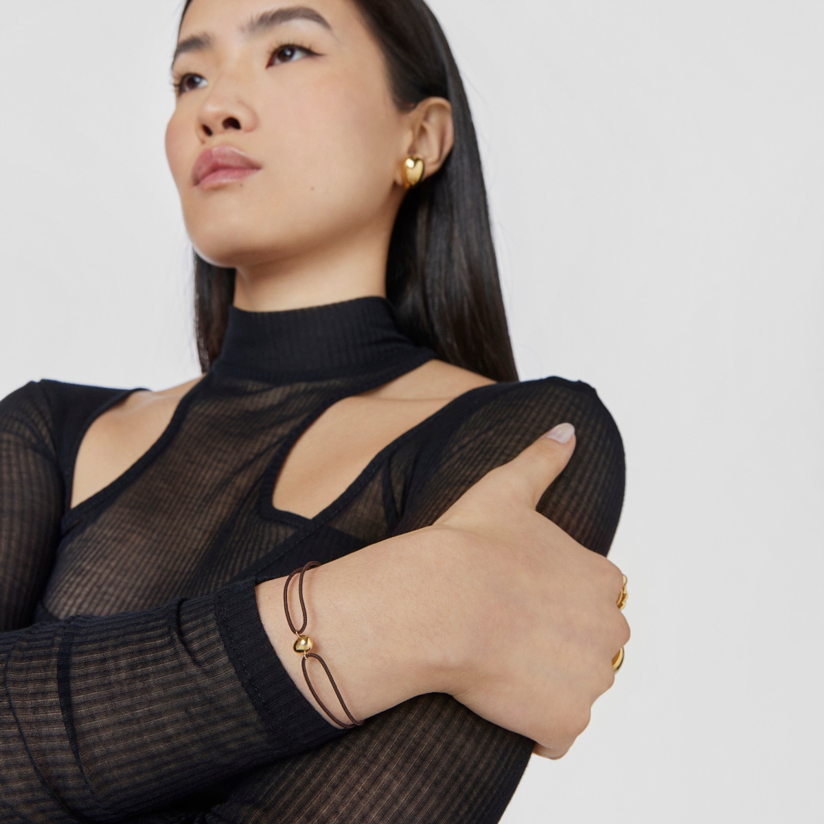 Pulsera lágrima de oro y cordón marrón TOUS Balloon