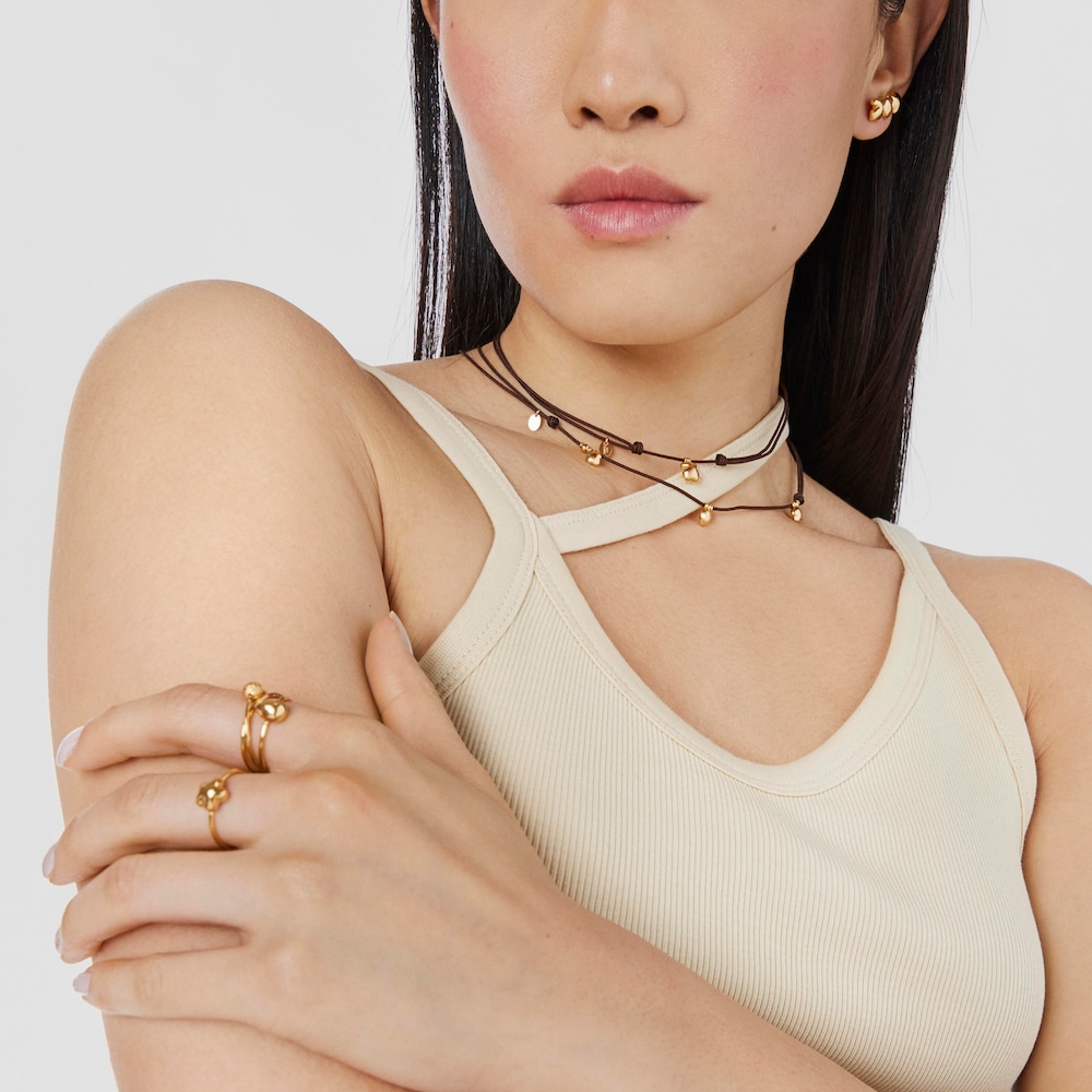 Naszyjnik ze złota z brązowym sznurkiem i motywem misia TOUS Balloon