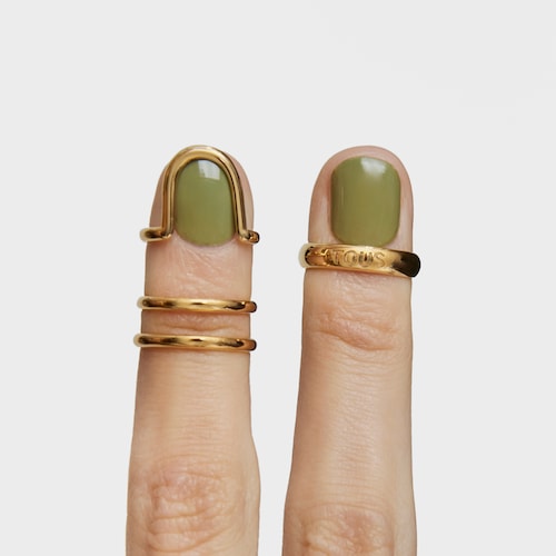 Ring set with 18kt gold plating over silver, double claw and logo Claws