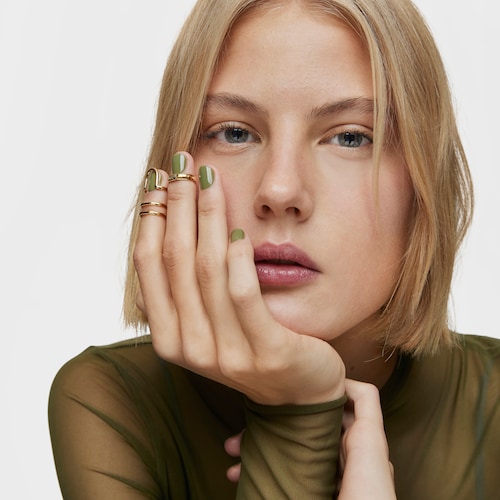 Ring set with 18kt gold plating over silver, double claw and logo Claws