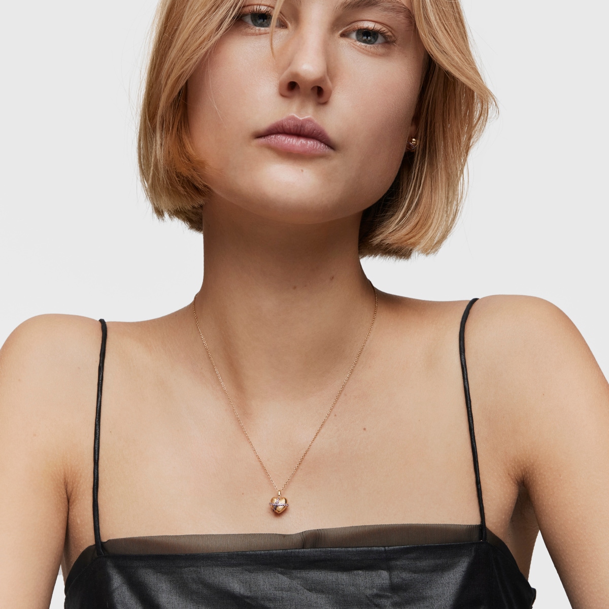 Collar mediano corazón con baño de oro 18 kt sobre plata y rodolita Lligat