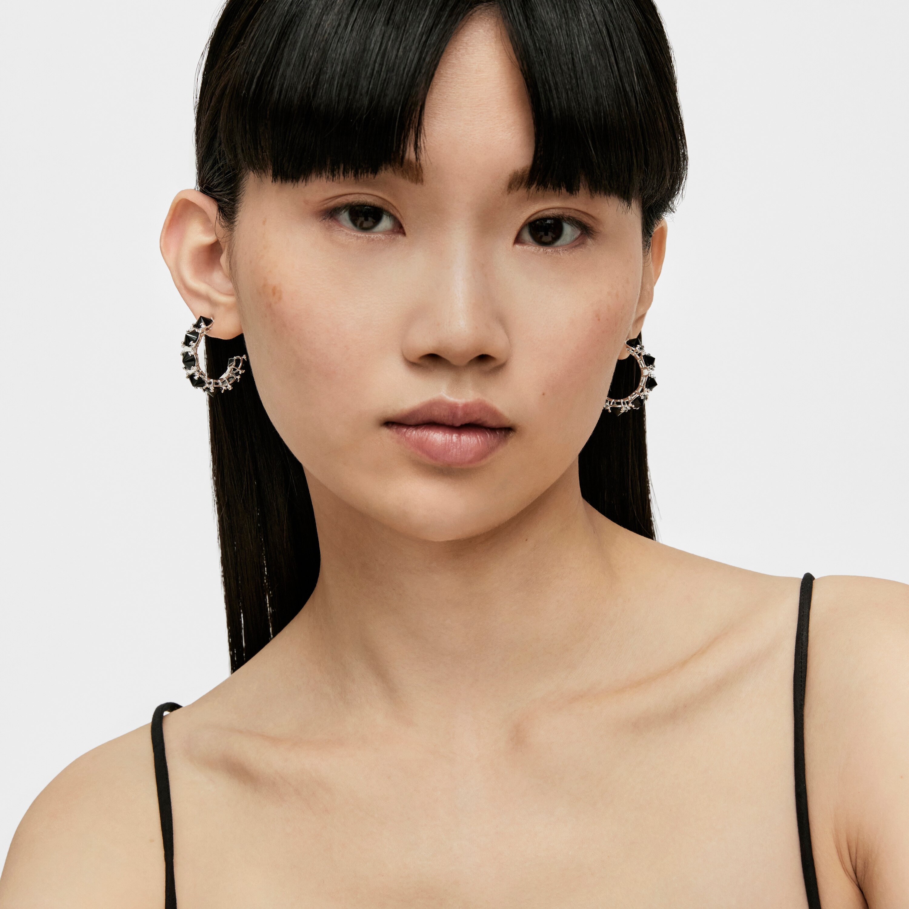 Large silver Color Pills Hoop earrings with onyx | TOUS