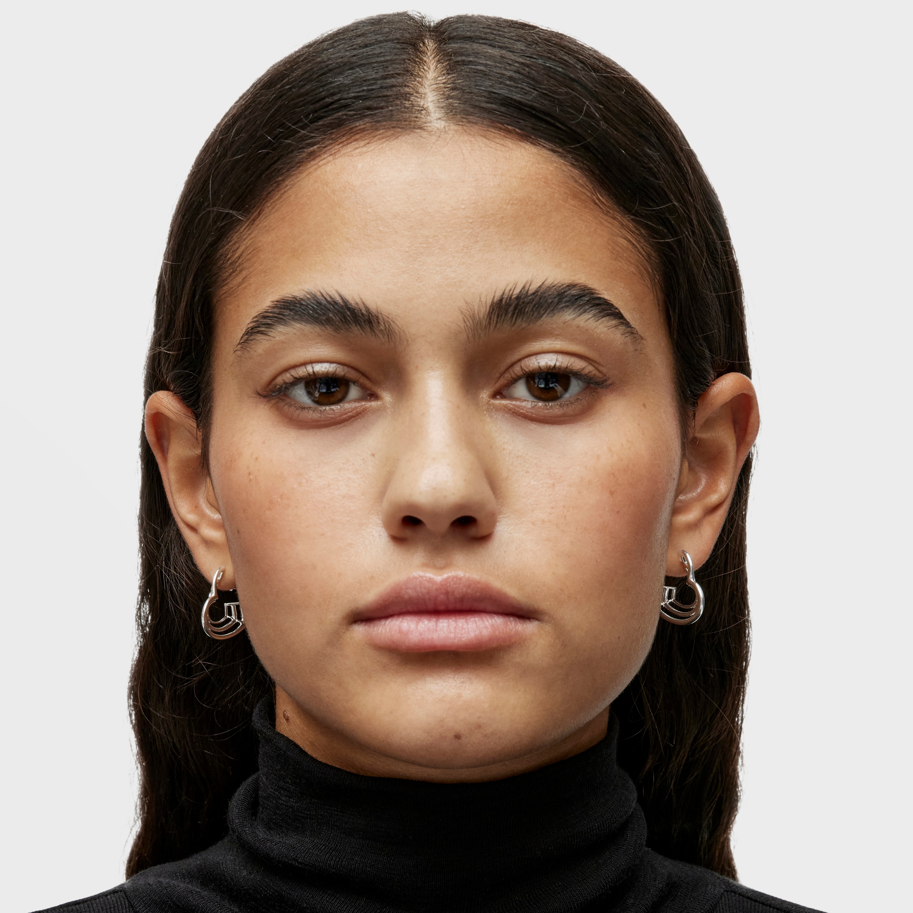 Small Bickie triple heart silver Earrings