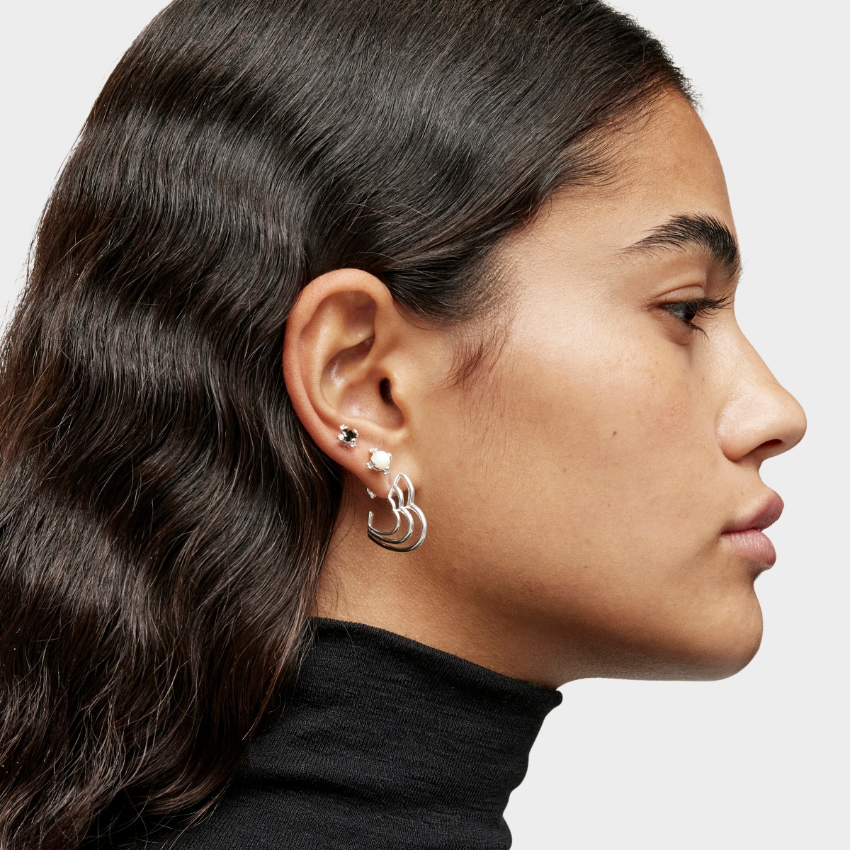 Pendientes pequeños triple corazón de plata Bickie