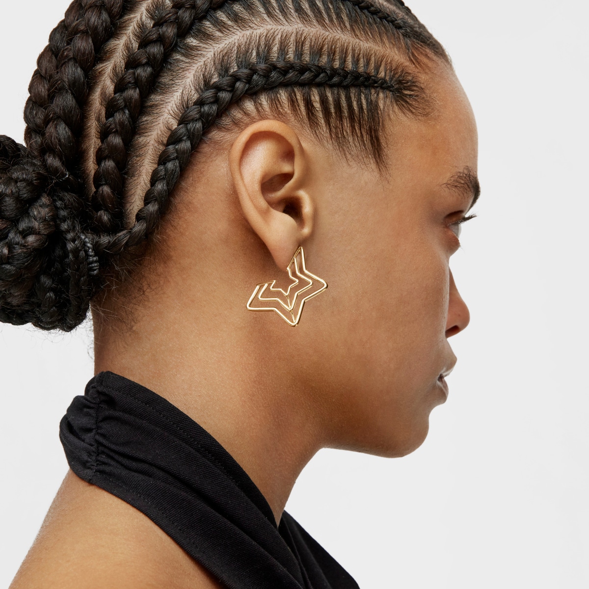 Bickie triple star Earrings with 18 kt gold plating over silver