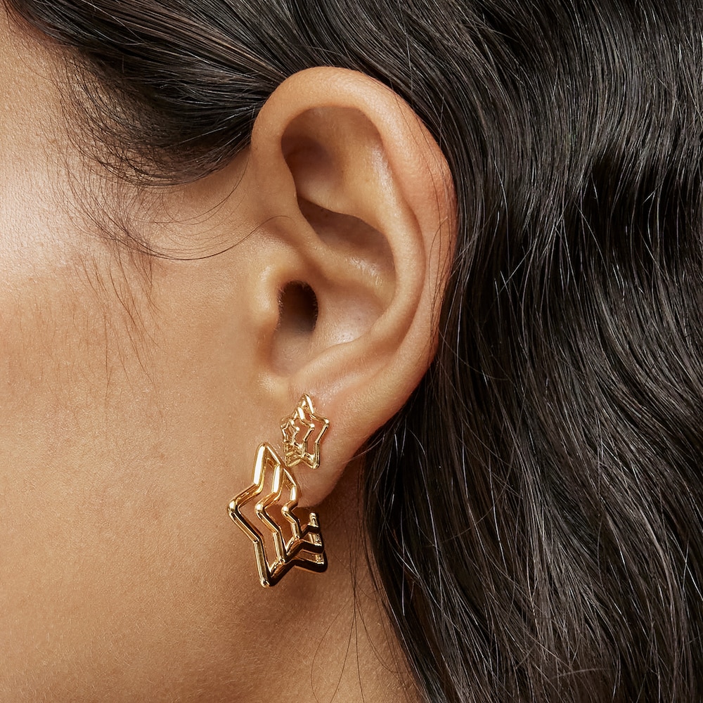 Pendientes peque&ntilde;os triple estrella con ba&ntilde;o de oro 18 kt sobre plata Bickie