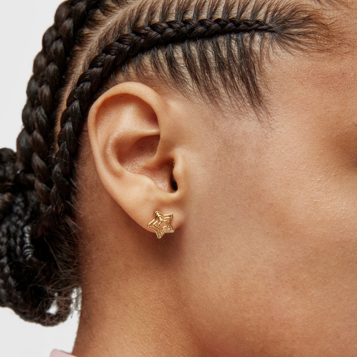 Bickie star Earrings with 18 kt gold plating over silver