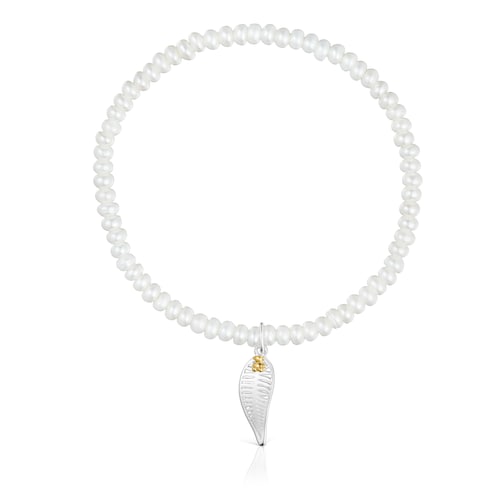 Yunque Elastic Bracelet with cultured pearls and two-tone charm