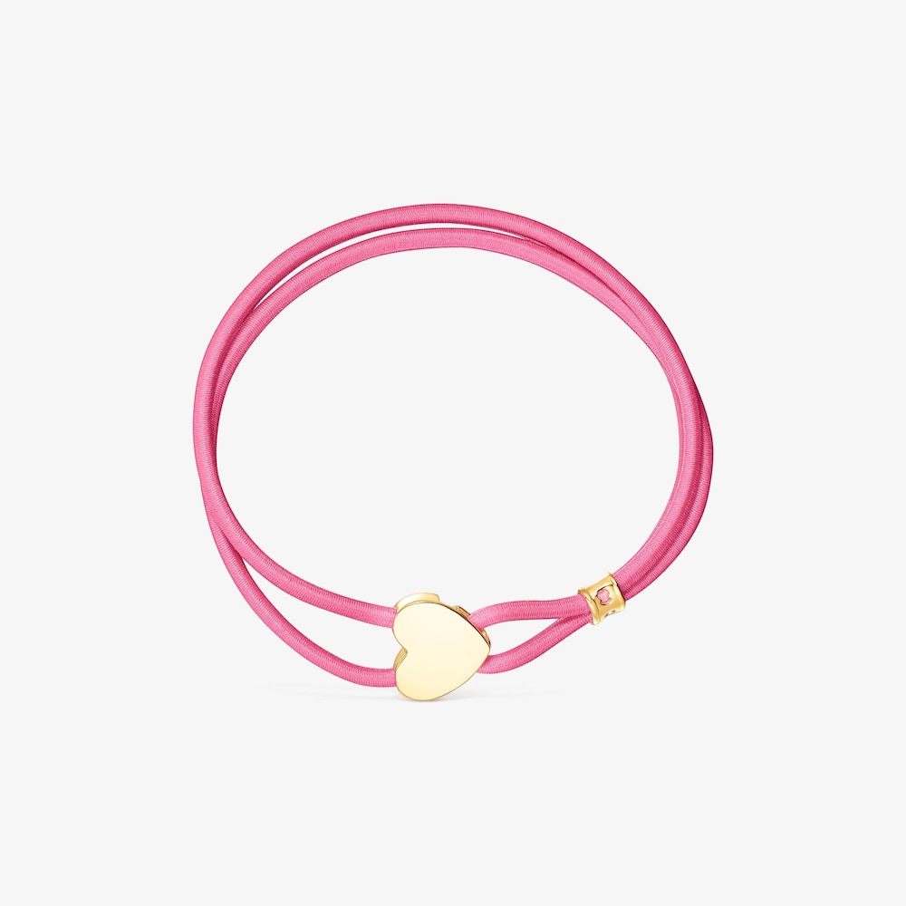 Pulsera el&aacute;stica fucsia y coraz&oacute;n con ba&ntilde;o de oro 18 kt sobre plata Sweet Dolls