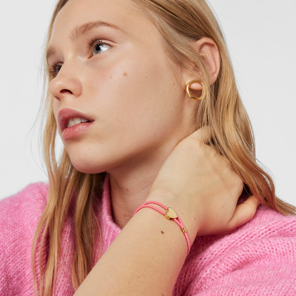 Pulsera el&aacute;stica fucsia y coraz&oacute;n con ba&ntilde;o de oro 18 kt sobre plata Sweet Dolls
