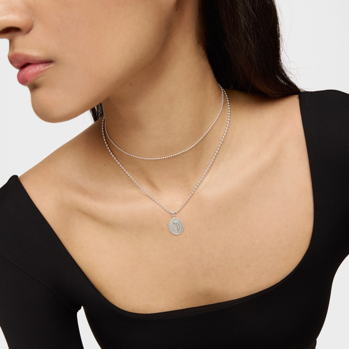 Devoción medallion pendant in silver