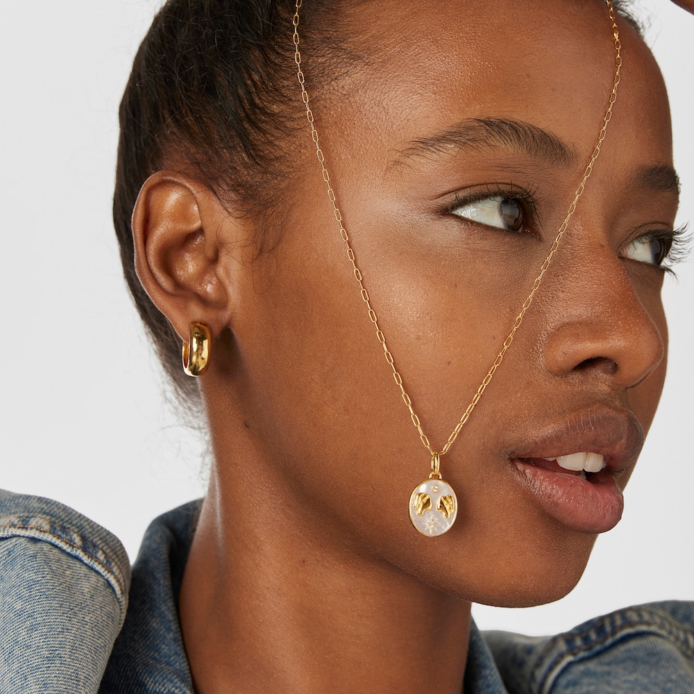 Colgante G&eacute;minis con ba&ntilde;o de oro 18 kt sobre plata, n&aacute;car y topacios TOUS Horoscope