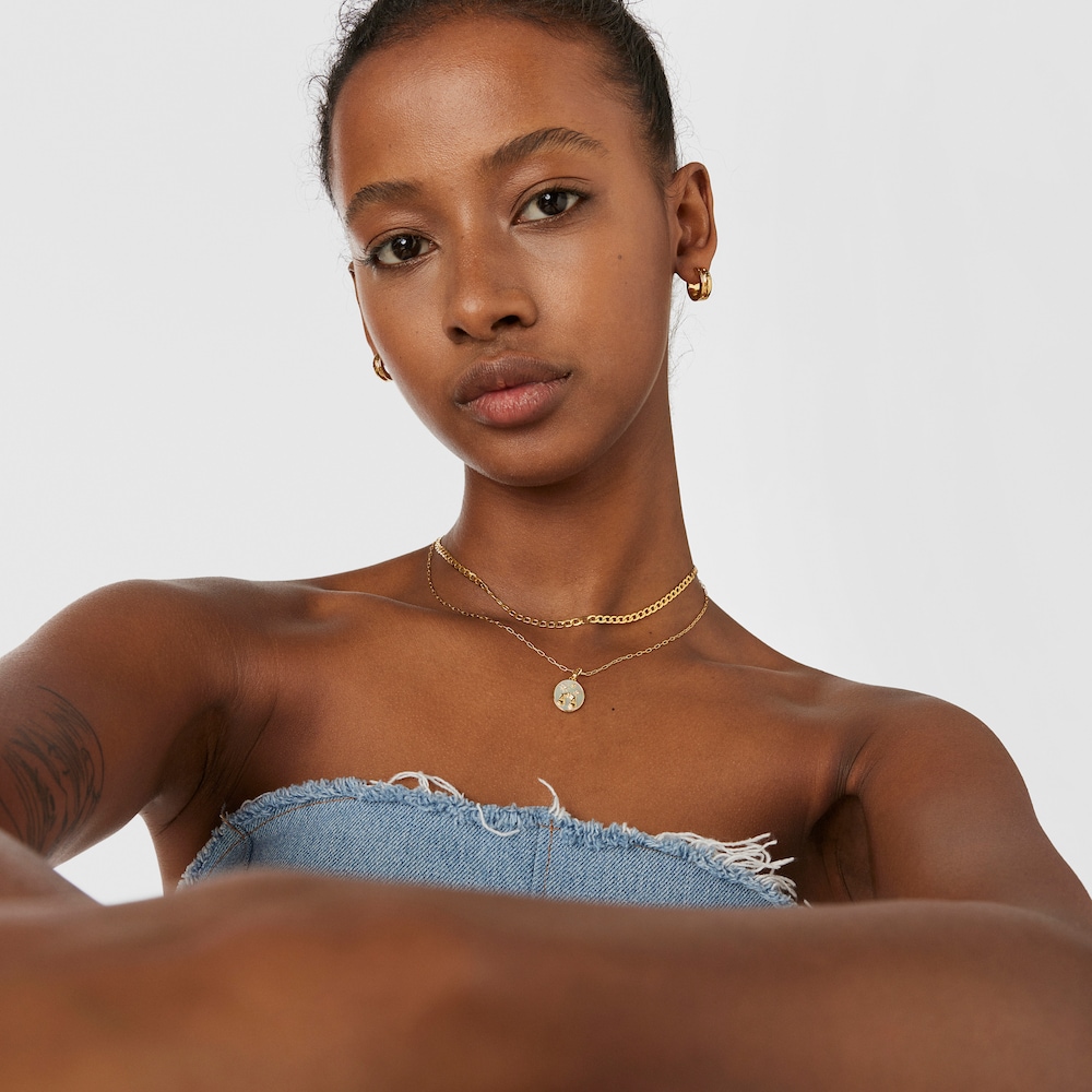 Dije Libra con ba&ntilde;o de oro 18 kt sobre plata con n&aacute;car y topacios  TOUS Horoscope