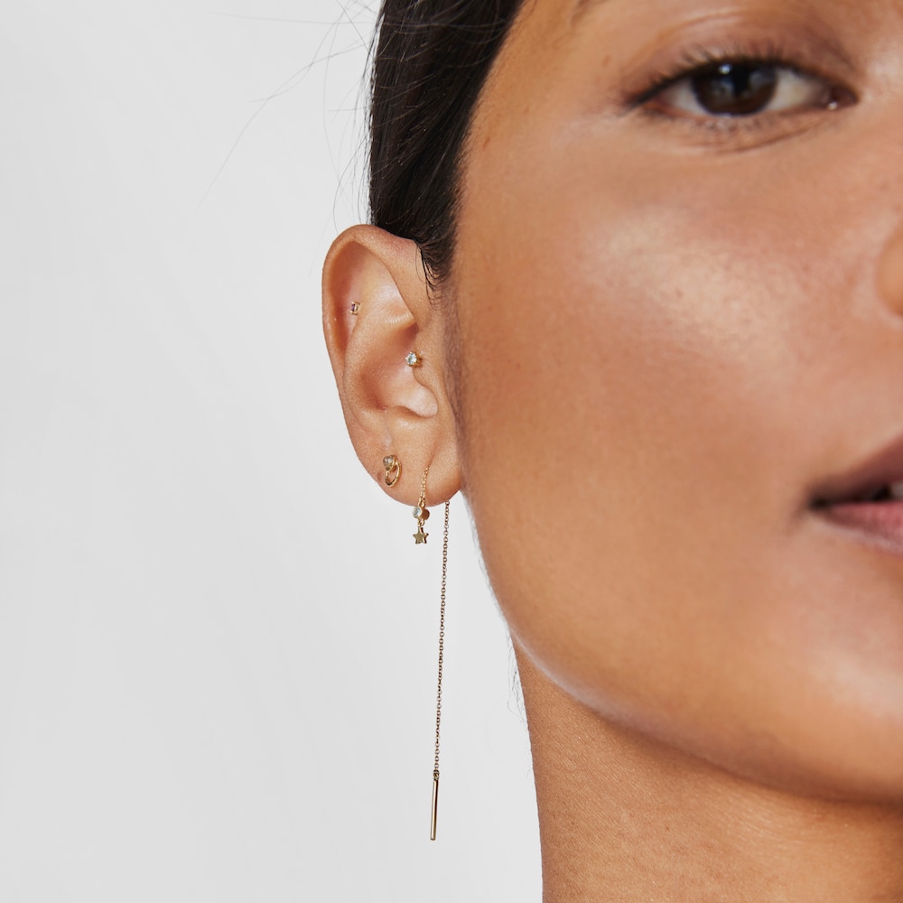 Piercing de oreja de oro con topacio Cool Joy