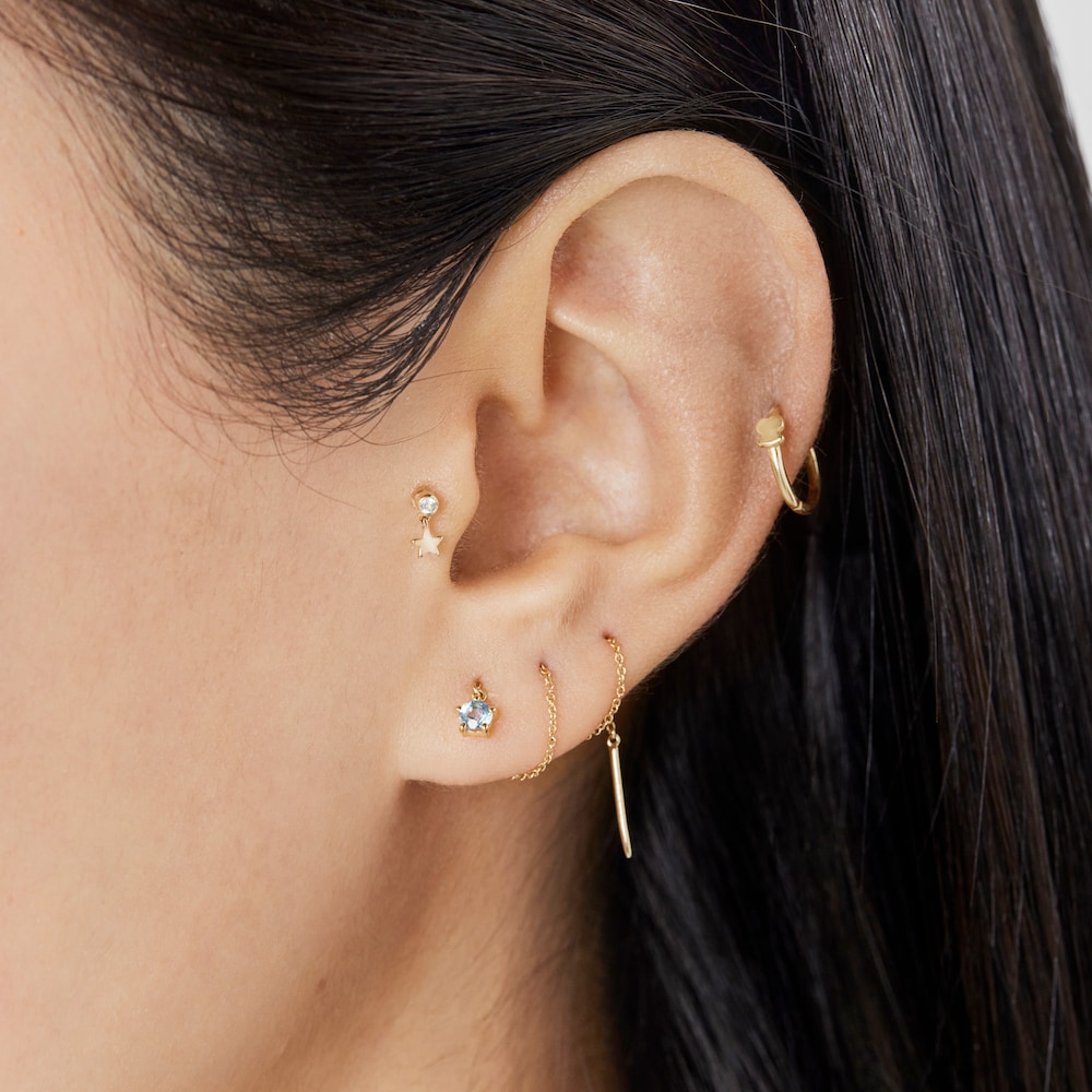 Piercing de oreja de oro con topacio y motivo estrella Cool Joy image number 4