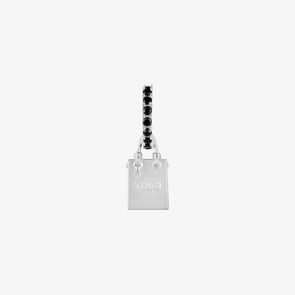 Single silver earring with motif Medallions