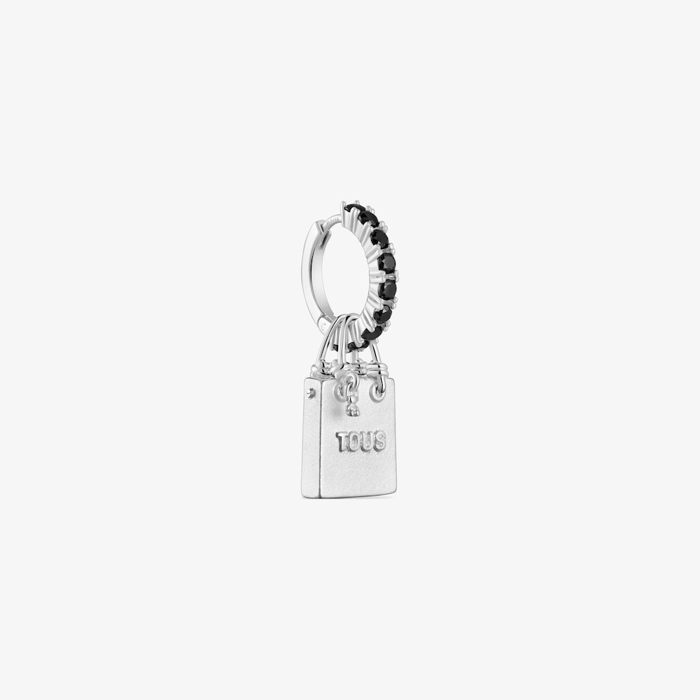 Single silver earring with motif Medallions