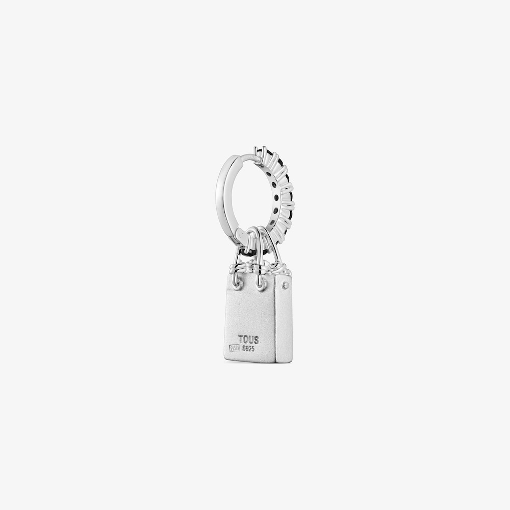 Single silver earring with motif Medallions