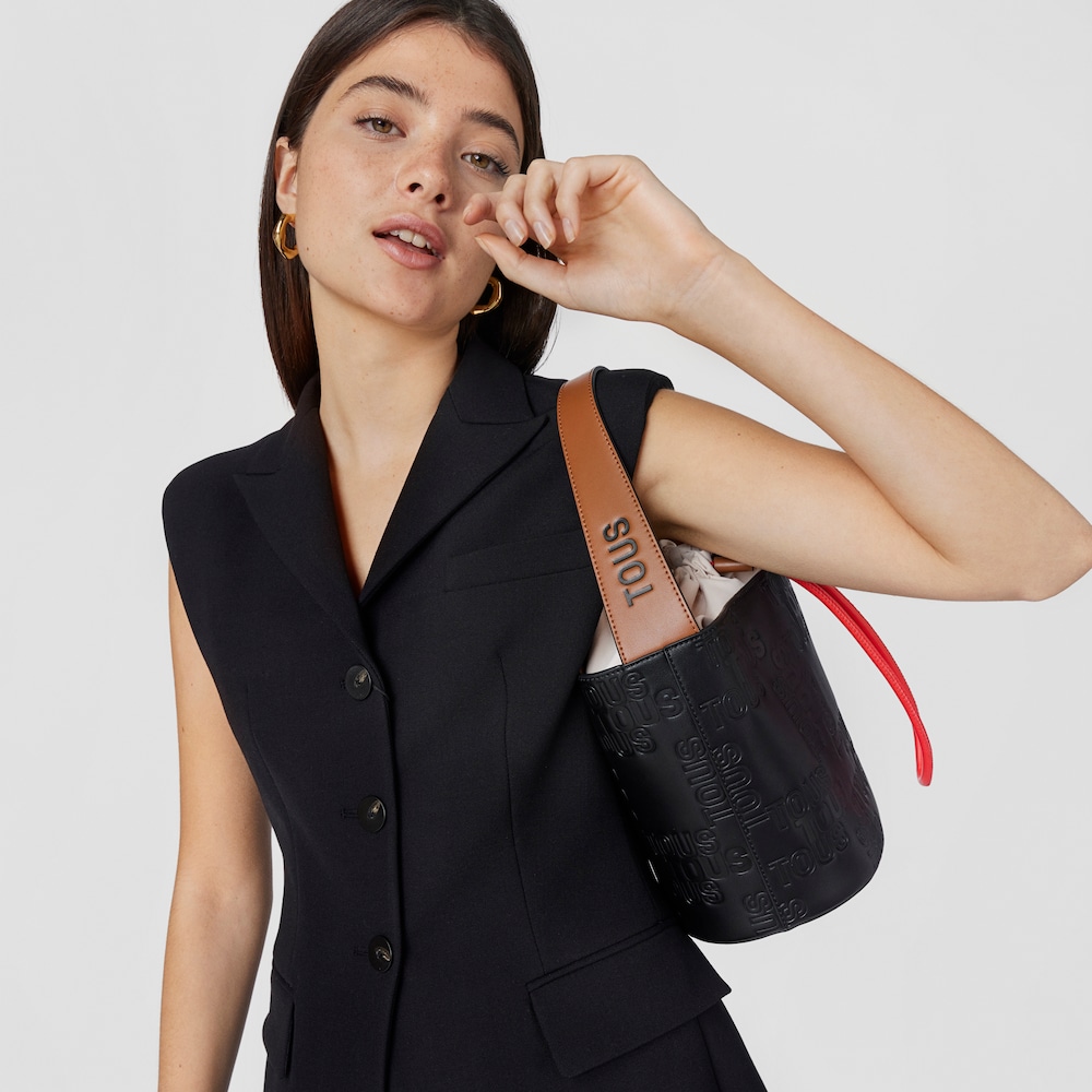 Torebka typu worek w kolorze czarnym i brązowym TOUS Nanda