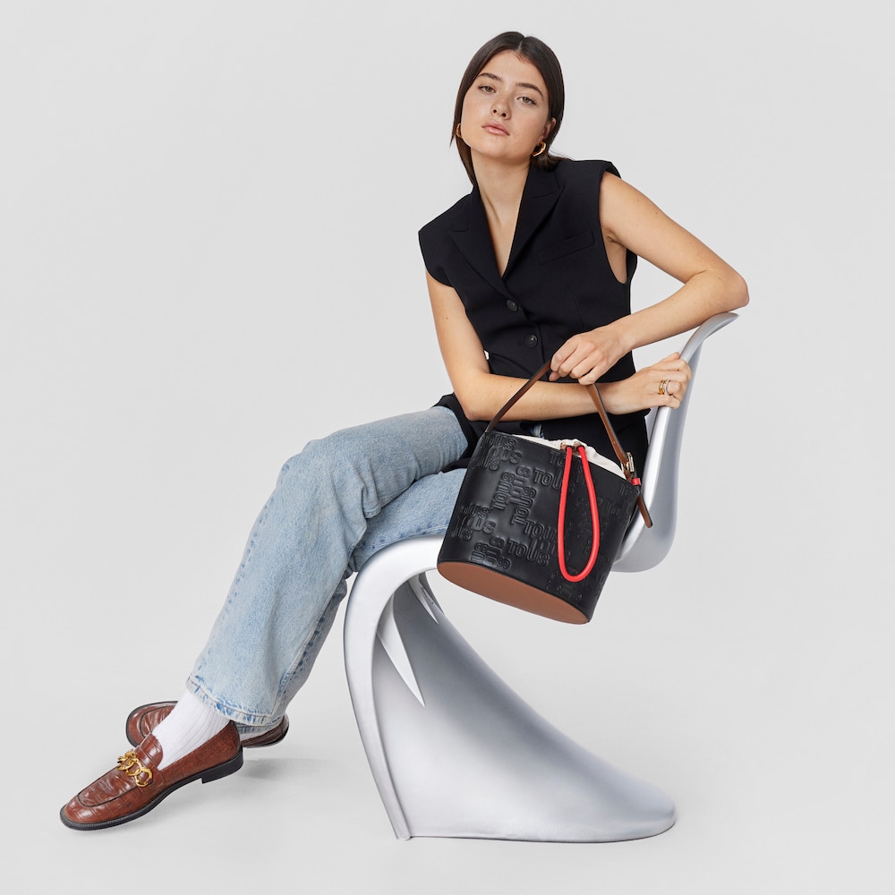 Torebka typu worek w kolorze czarnym i brązowym TOUS Nanda