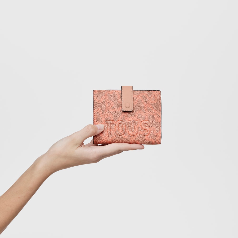 Cartera naranja Kaos Icon