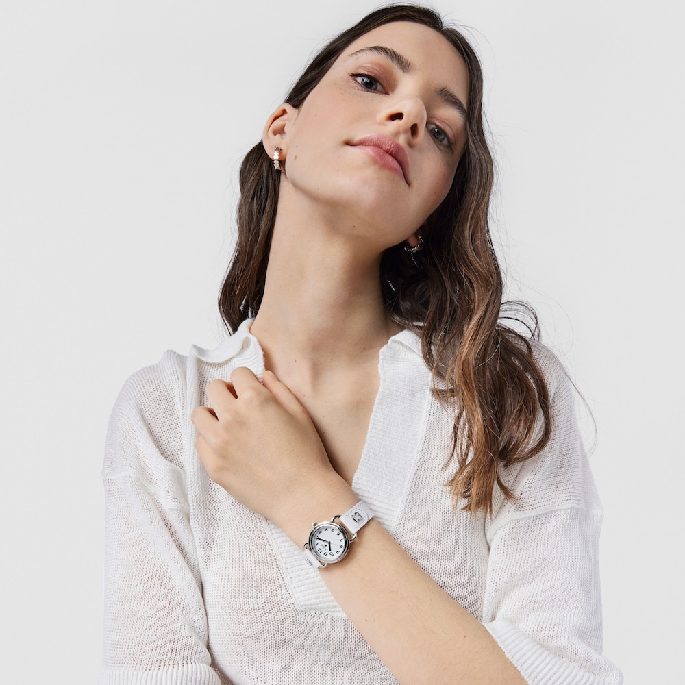 Reloj anal&oacute;gico Baby Bear de acero con correa de piel blanca