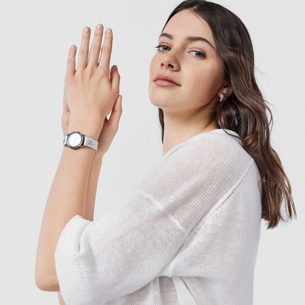 Reloj anal&oacute;gico Baby Bear de acero con correa de piel blanca