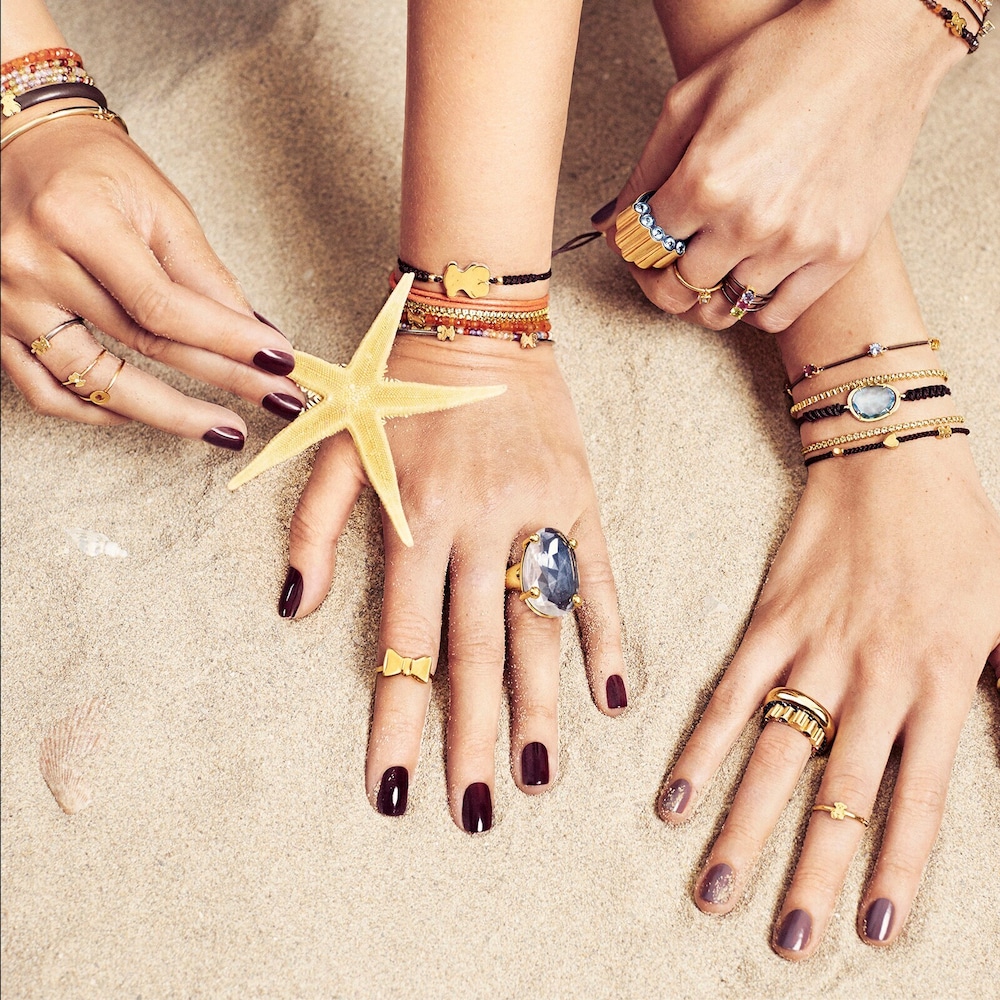 18K solid gold Sweet Dolls XXS Bracelet with Bear, Star and Heart motifs.