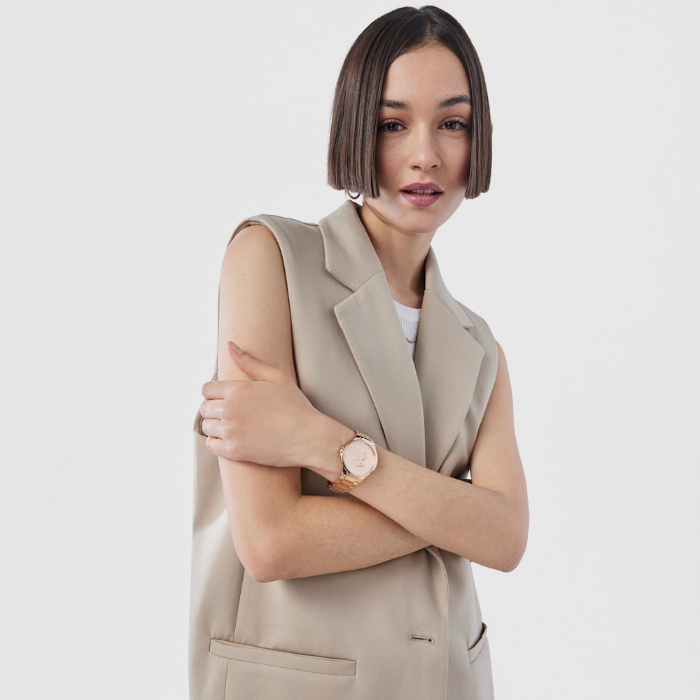 Reloj anal&oacute;gico Motion de acero IP rosado con cristales de colores