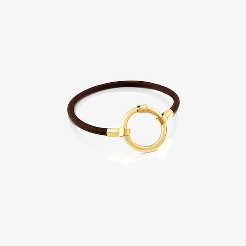 Pulsera con ba&ntilde;o de oro 18 kt sobre plata y cuero Hold