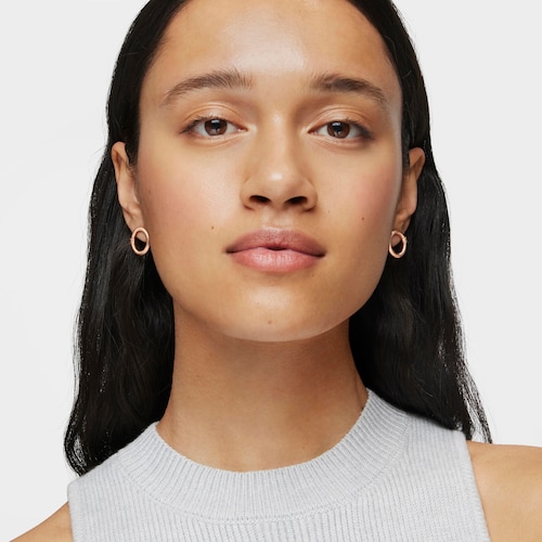 Pendientes pequeños con baño de oro rosa 18 kt sobre plata Hold