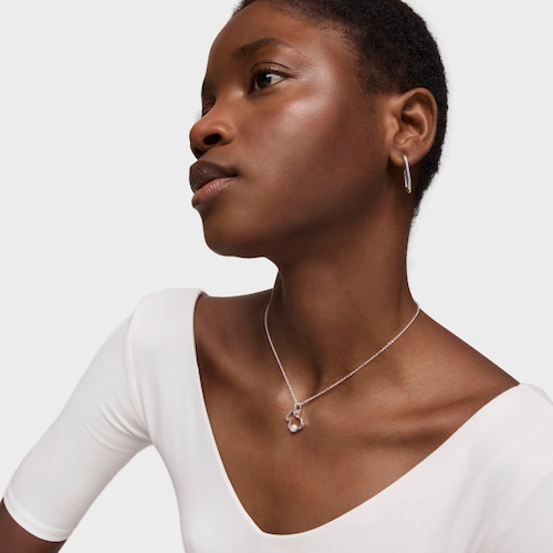 Collar de plata con perla cultivada motivo silueta oso Silueta