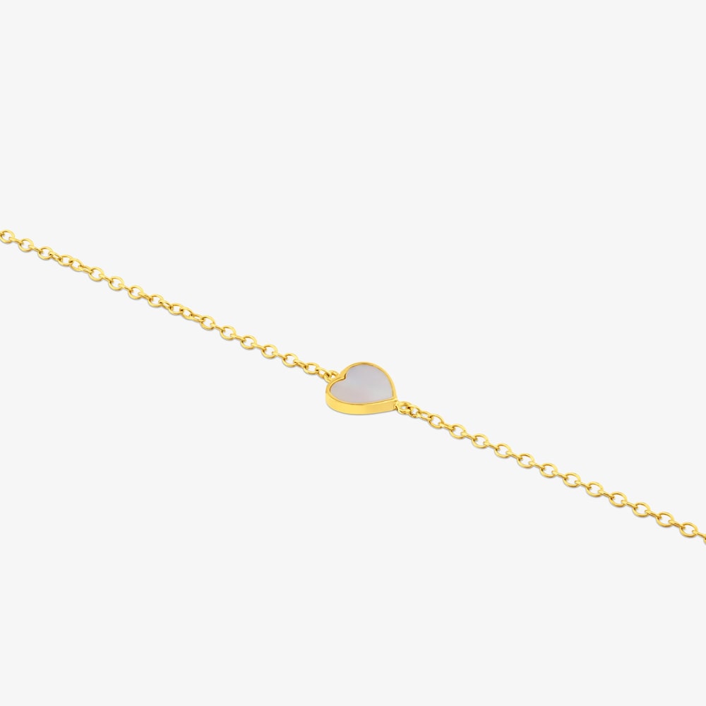 Pulsera coraz&oacute;n de oro y n&aacute;car XXS