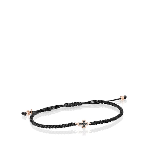 Pulsera cruz con baño de oro rosa 18 kt sobre plata, espinelas y cordón negro Motif